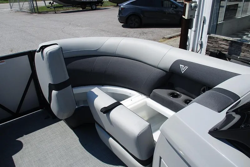 Slide: The Image of Interior of 2025 Viaggio Lago X20R boat with gray seating and storage compartment. - 16