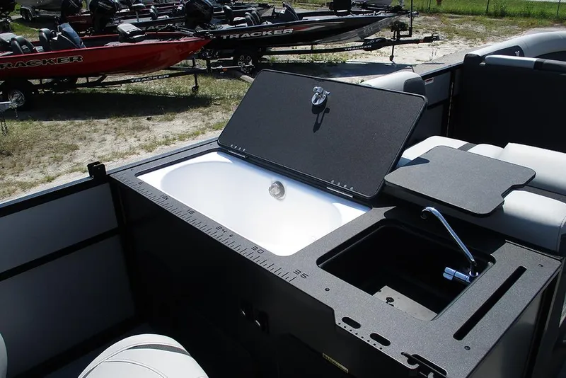 Slide: The Image of Viaggio Lago X20R 2025 boat interior with sink and seating, featuring a sleek design. - 25