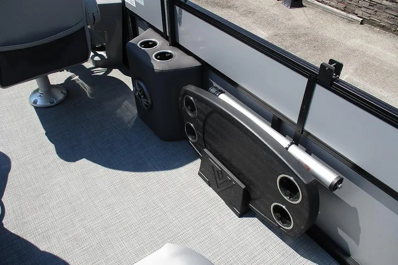 Slide: The Image of Interior of 2025 Viaggio Lago X20R boat with cup holders and speaker system. - 34