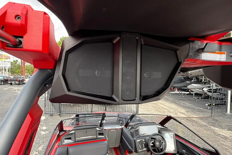 Slide: The Image of 2026 Supra SE 550 boat interior with advanced sound system and sleek dashboard design. - 26