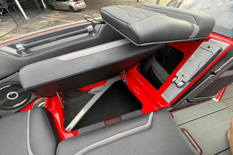 Slide: The Image of 2026 Supra SE 550 interior with red accents and adjustable seating. - 29