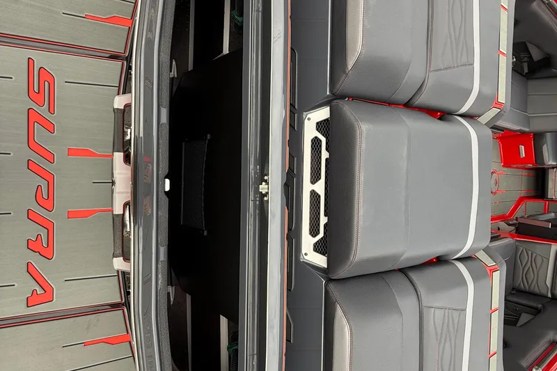 Slide: The Image of 2026 Supra SE 550 interior with sleek gray and red design, showcasing premium seating. - 8