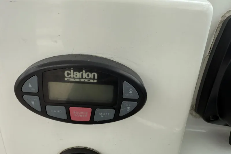 Slide: The Image of Clarion Marine audio system on 2005 Back Cove 26 boat dashboard. - 41