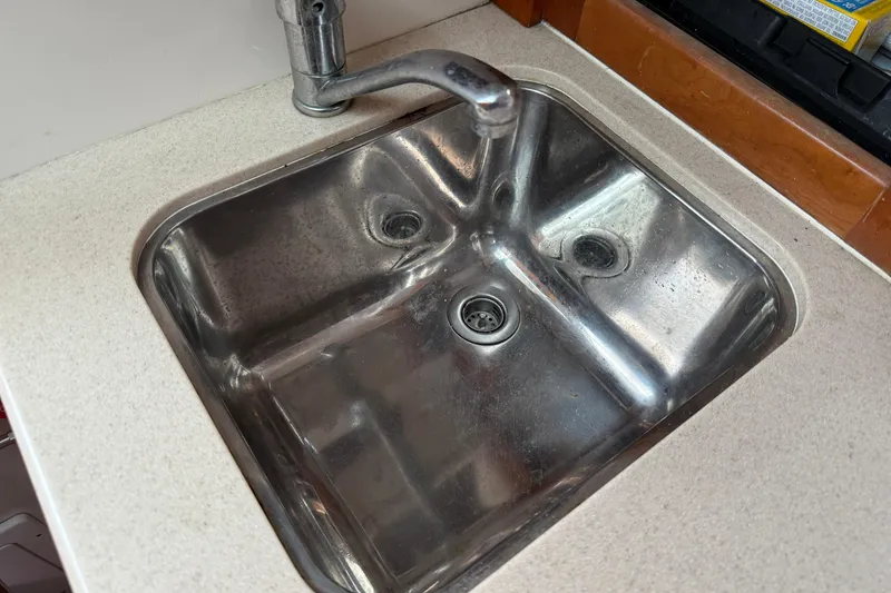 Slide: The Image of Stainless steel sink in 2005 Back Cove 26 boat galley. - 54