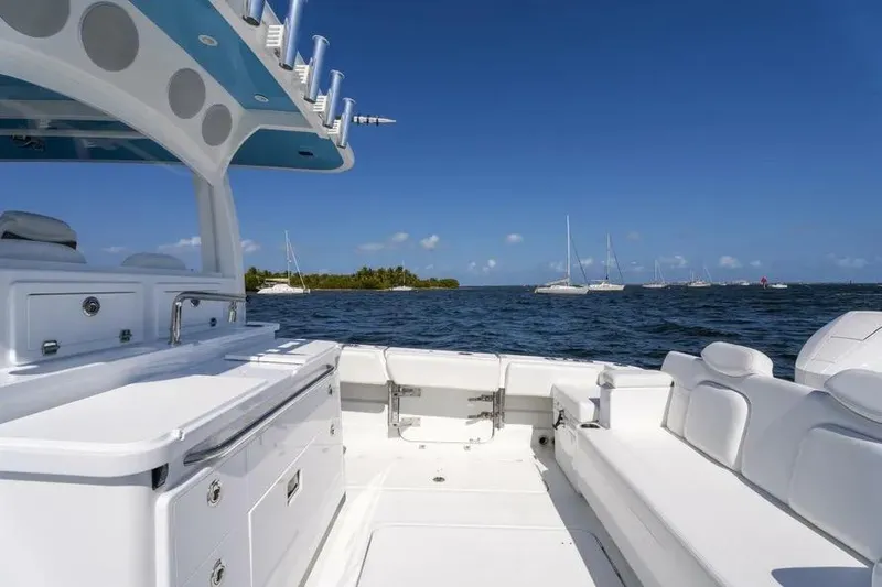 Slide: The Image of 2025 HCB 42 Lujo boat interior with ocean view and clear blue sky. - 23