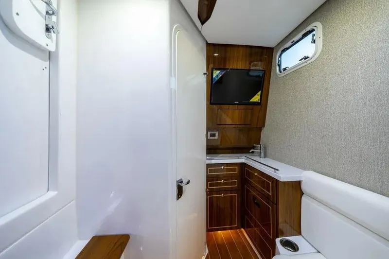 Slide: The Image of Luxurious interior of 2025 HCB 42 Lujo yacht with modern amenities and sleek design. - 28