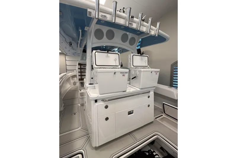 Slide: The Image of Interior of 2025 HCB 42 Lujo boat featuring storage compartments and modern design elements. - 37