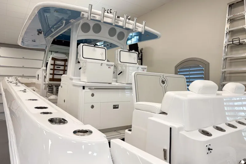 Slide: The Image of 2025 HCB 42 Lujo boat interior with sleek white design and modern amenities. - 38