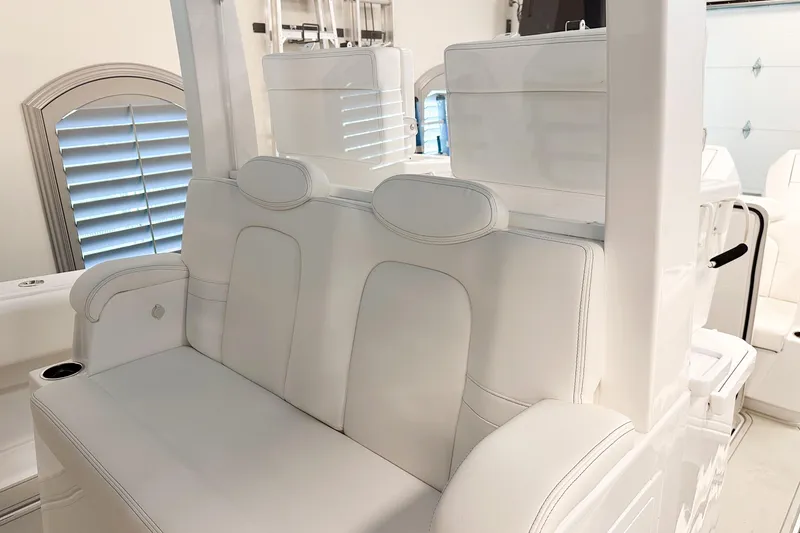 Slide: The Image of Luxurious white seating on 2025 HCB 42 Lujo boat, featuring sleek design and comfort. - 48