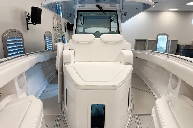 Slide: The Image of 2025 HCB 42 Lujo boat interior with luxurious white seating and modern design. - 59