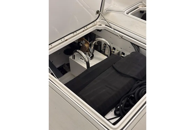 Slide: The Image of 2025 HCB 42 Lujo boat storage compartment with ropes and equipment. - 62