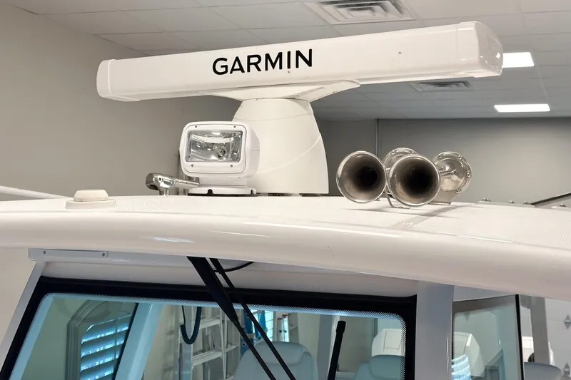 Slide: The Image of 2025 HCB 42 Lujo boat with Garmin radar and dual horns on the roof. - 64