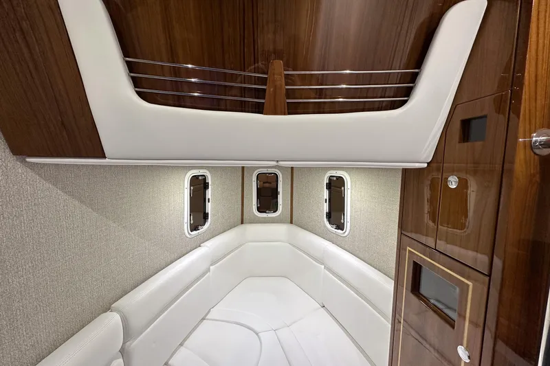 Slide: The Image of Luxurious interior of 2025 HCB 42 Lujo boat with elegant wood and leather finishes. - 70