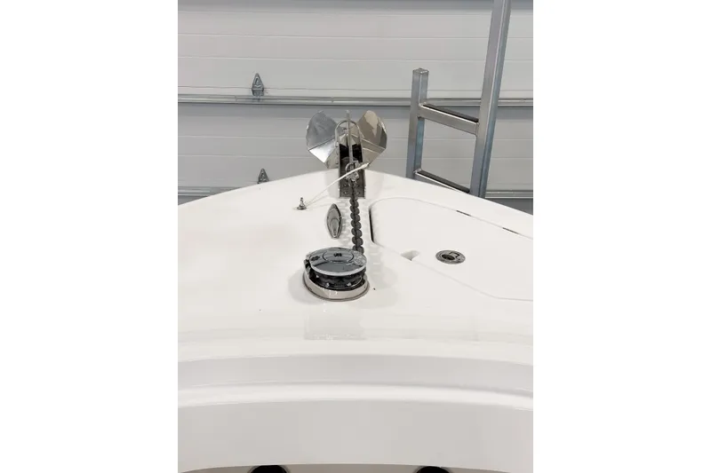 Slide: The Image of 2025 HCB 42 Lujo boat anchor system in a garage setting. - 76