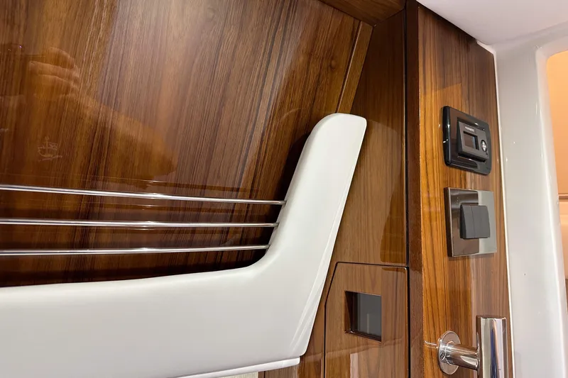 Slide: The Image of Interior detail of 2025 HCB 42 Lujo with wood paneling and modern controls. - 79