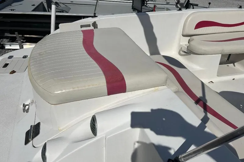 Slide: The Image of 2008 Spectra 2040 boat seating with red and white upholstery design. - 8