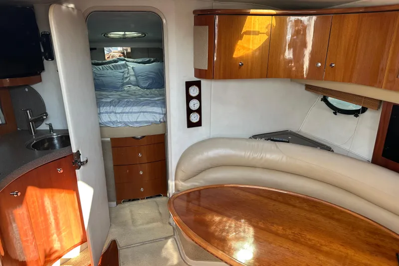 Slide: The Image of Cockpit view of 2000 Doral 360 SE boat with Raymarine navigation system. - 12