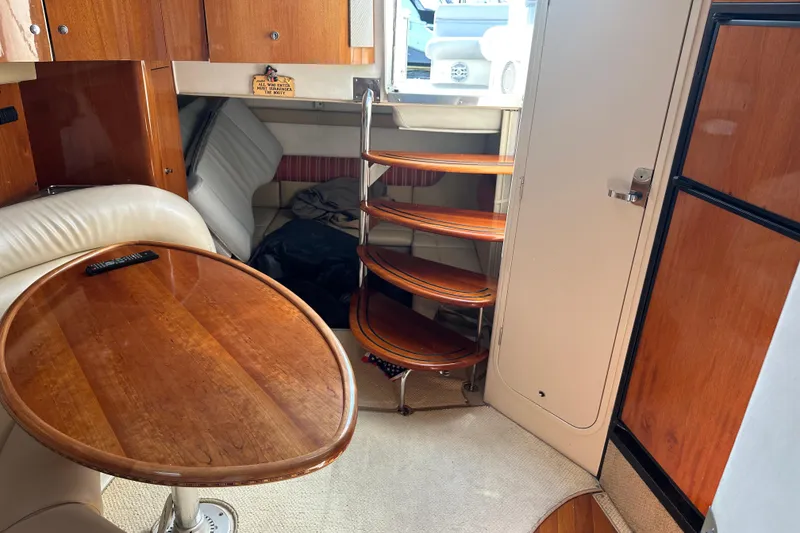 Slide: The Image of Control panel of a 2000 Doral 360 SE boat with joystick and switches. - 13