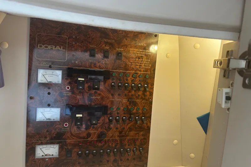 Slide: The Image of Interior of 2000 Doral 360 SE yacht with cozy seating and wooden cabinetry. - 15