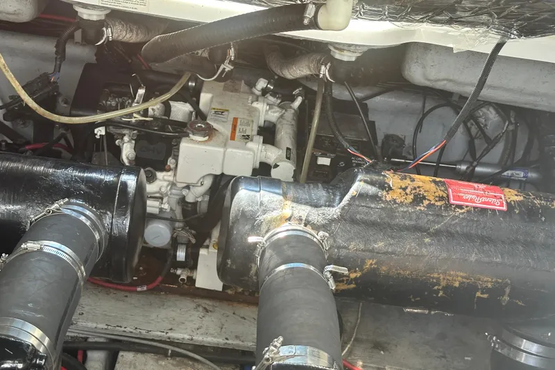 Slide: The Image of Interior of 2000 Doral 360 SE yacht with kitchenette, TV, and gauges. - 19