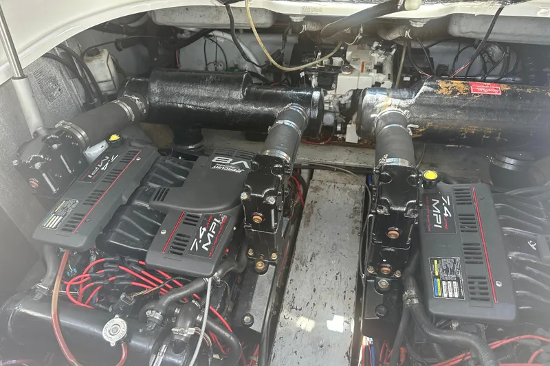 Slide: The Image of Engine compartment of a 2000 Doral 360 SE boat with twin 7.4 MPI engines. - 23