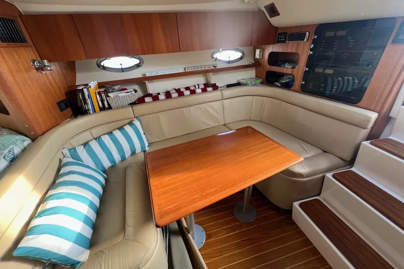 Slide: The Image of Control panel of a 2003 Tiara Yachts 3100 Open, featuring DC and AC systems. - 13