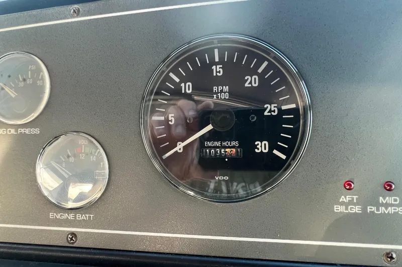 Slide: The Image of 2003 Tiara Yachts 3100 Open bathroom with sink, shower, and storage. - 18