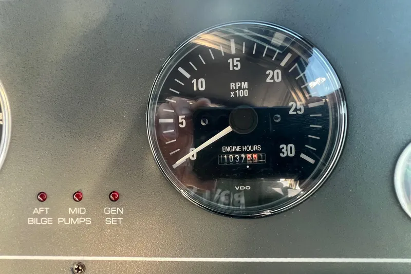 Slide: The Image of Dashboard of 2003 Tiara Yachts 3100 Open showing RPM and engine hours. - 20