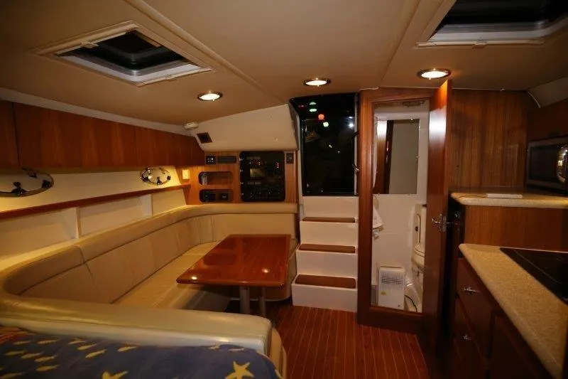 Slide: The Image of 2003 Tiara Yachts 3100 Open boat deck, spacious and well-maintained. - 24
