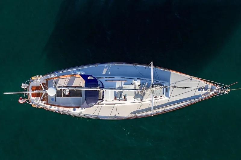 Slide: The Image of Aerial view of 1971 Hinckley Bermuda 40 Custom Yawl on clear water. - 13