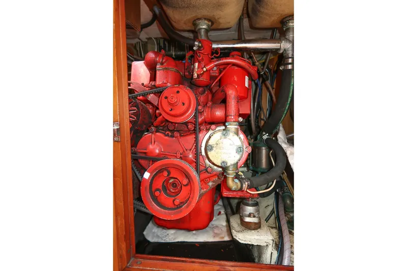 Slide: The Image of Red engine of a 1971 Hinckley Bermuda 40 Custom Yawl, detailed view. - 38