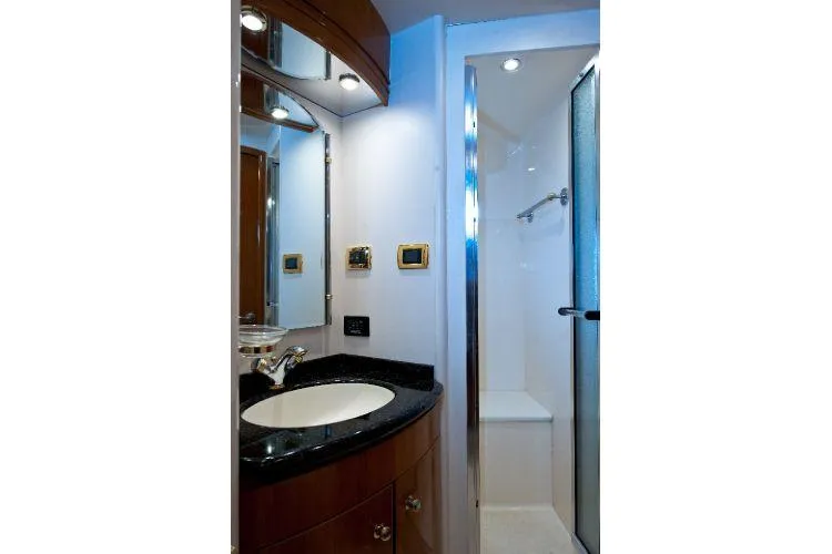 Slide: The Image of Luxurious bathroom in 2001 Carver 530 Voyager Pilothouse yacht with modern fixtures. - 10