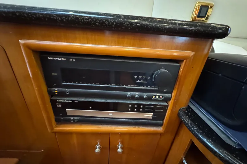 Slide: The Image of Harman Kardon audio system in 2001 Carver 530 Voyager Pilothouse yacht interior. - 24
