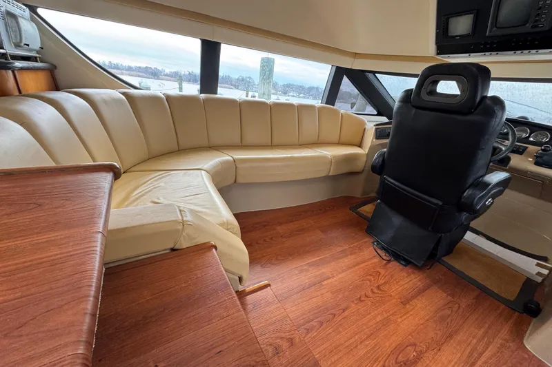 Slide: The Image of Pilothouse interior of 2001 Carver 530 Voyager with leather seating and wood flooring. - 20