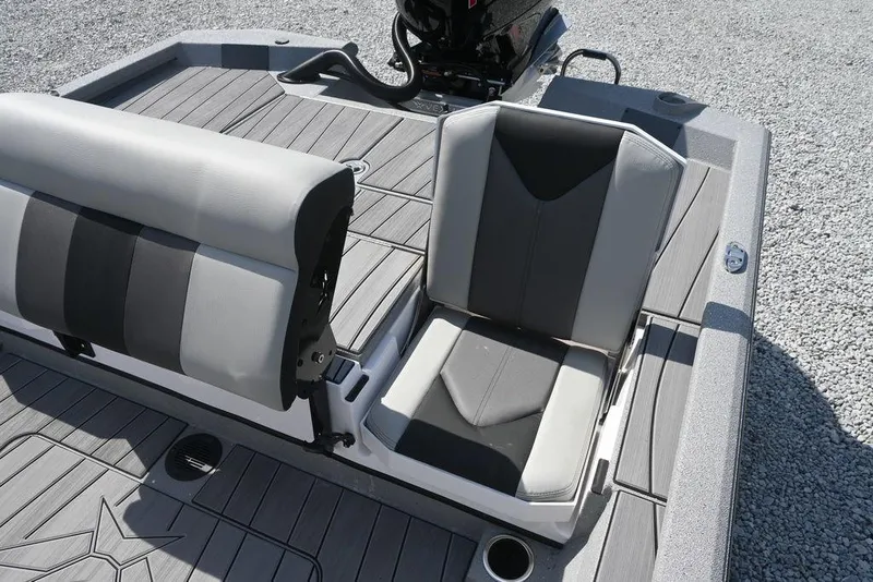 Slide: The Image of 2026 Vexus ACX 2000 boat seating area with gray cushioned seats and deck. - 10