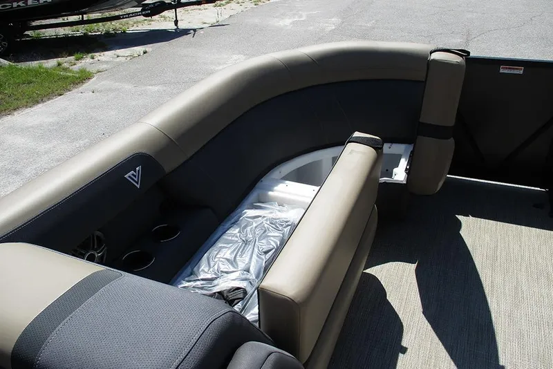 Slide: The Image of Interior of 2025 Viaggio Lago X22U pontoon boat with beige seating and cup holders. - 11