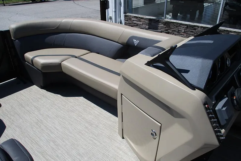 Slide: The Image of Luxurious interior of 2025 Viaggio Lago X22U pontoon boat with plush seating and modern dashboard. - 14