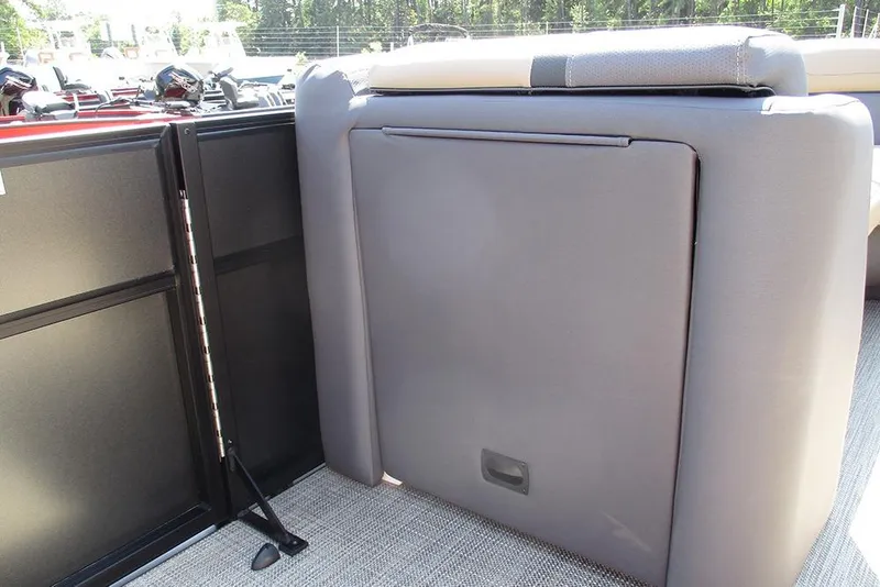 Slide: The Image of 2025 Viaggio Lago X22U boat interior with sleek seating and storage compartment. - 19