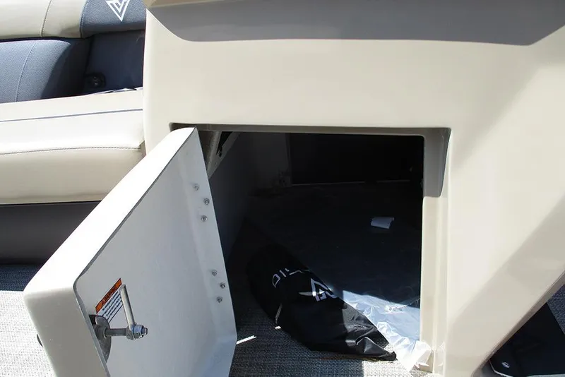 Slide: The Image of Open storage compartment in 2025 Viaggio Lago X22U boat interior. - 24