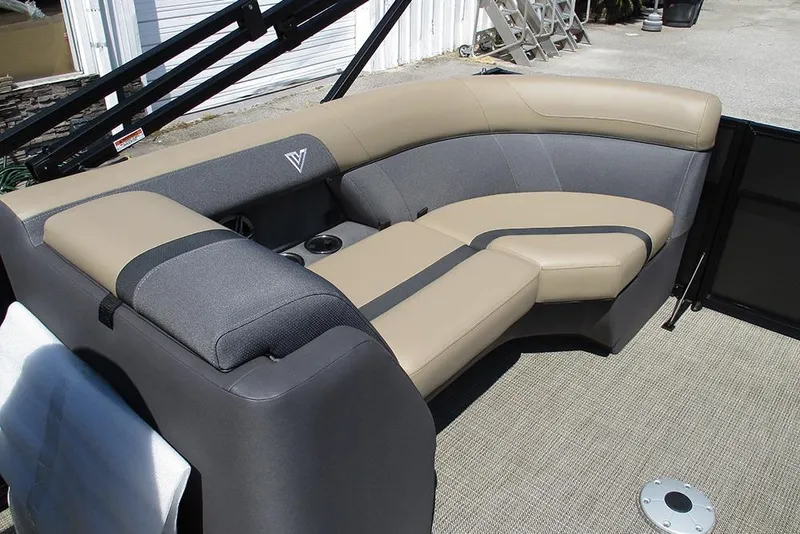 Slide: The Image of Luxurious seating on 2025 Viaggio Lago X22U boat, featuring beige and gray upholstery. - 25