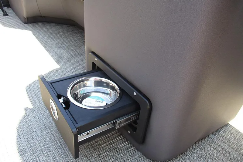 Slide: The Image of Pull-out pet bowl in Viaggio Lago X22U, 2025 model, on carpeted floor. - 31