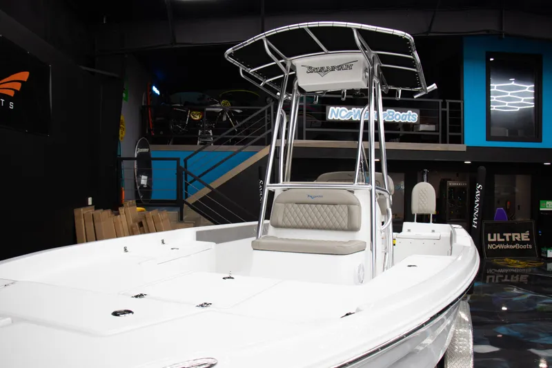 Slide: The Image of 2025 Savannah 210X boat displayed indoors with sleek design and modern features. - 15