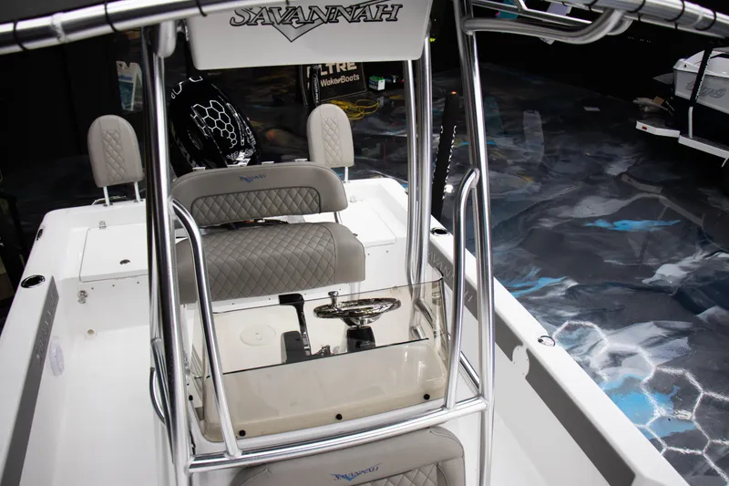 Slide: The Image of 2025 Savannah 210X boat interior with sleek design and comfortable seating. - 8