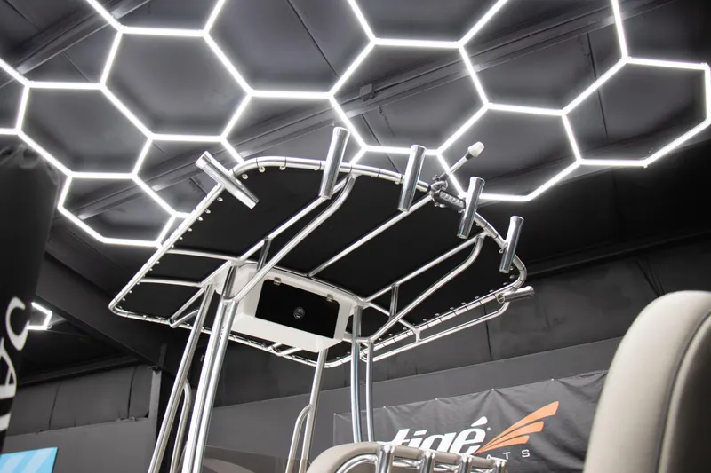 Slide: The Image of Modern Savannah 210X boat interior with sleek design and hexagonal ceiling lights, 2025 model. - 9