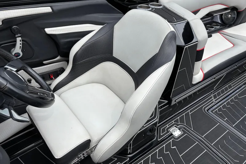 Slide: The Image of 2018 Centurion Ri257 interior with sleek black and white seating and modern design elements. - 11