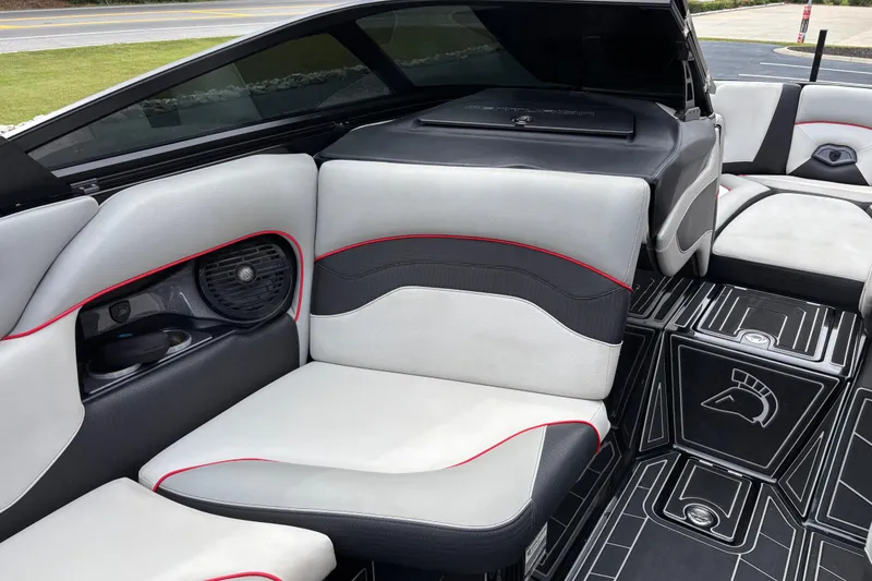 Slide: The Image of 2018 Centurion Ri257 boat interior with stylish seating and modern design elements. - 12