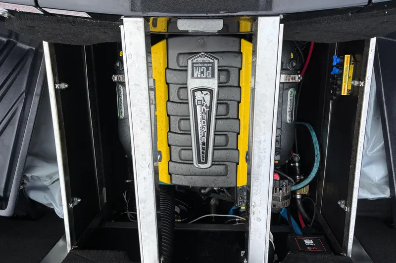 Slide: The Image of 2018 Centurion Ri257 engine compartment showcasing PCM engine components. - 13