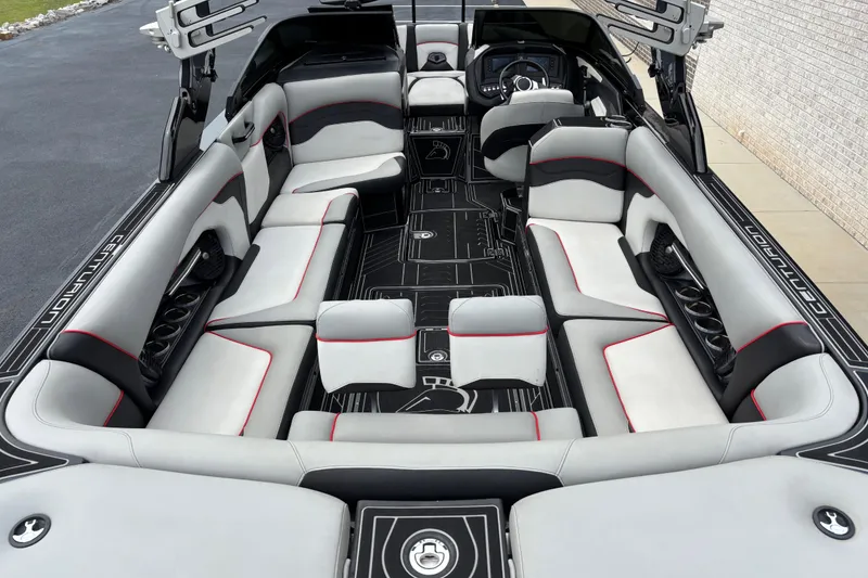Slide: The Image of 2018 Centurion Ri257 boat interior with luxurious seating and modern design. - 8