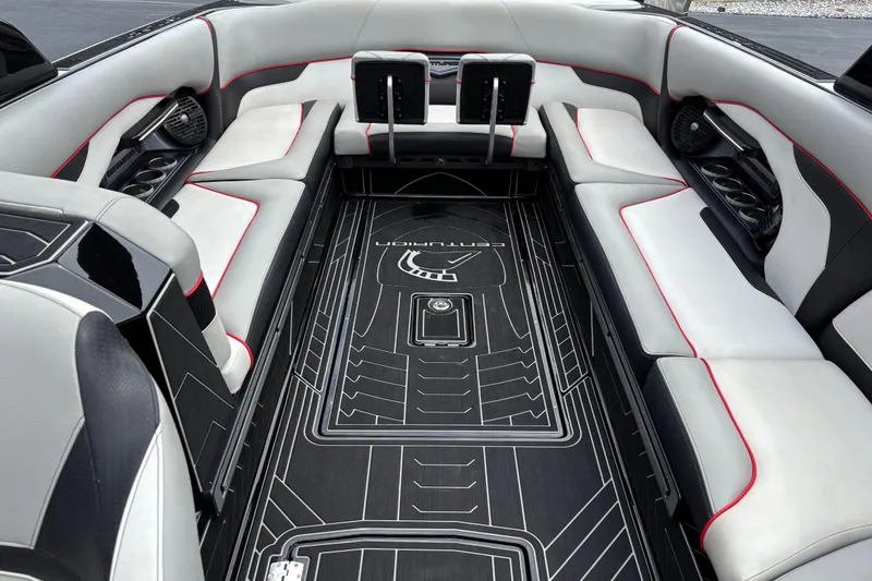 Slide: The Image of Luxurious interior of a 2018 Centurion Ri257 boat with sleek seating and modern design. - 9