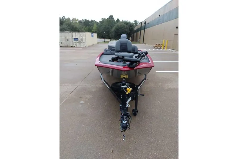Slide: The Image of 2024 Bass Tracker Pro 170 boat on trailer in parking lot, front view. - 9